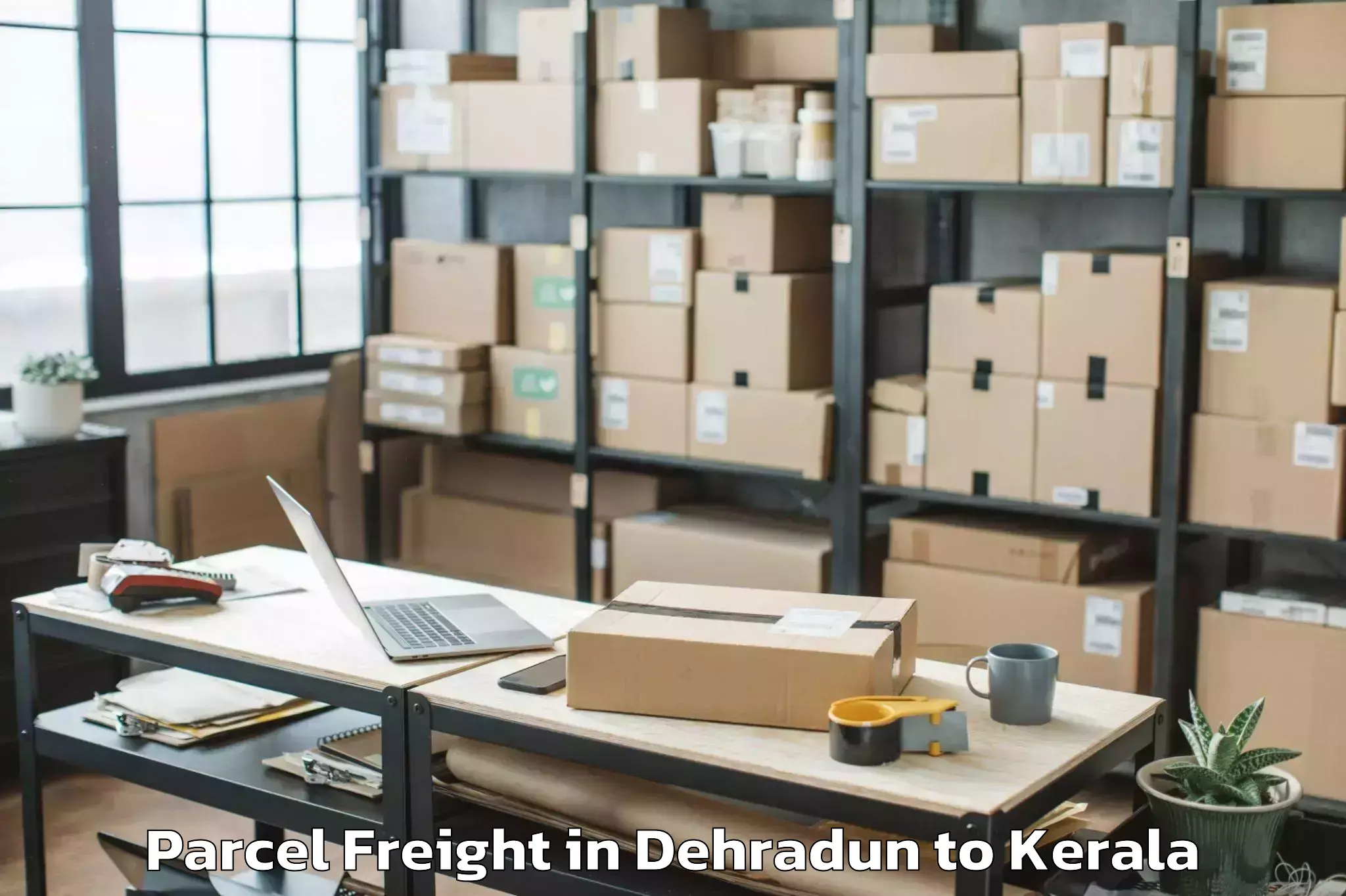 Book Dehradun to Thalassery Parcel Freight